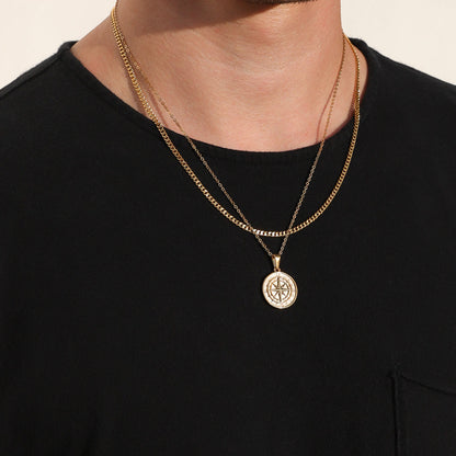 Gold compass pendant necklace with round compass medallion and hanging bail