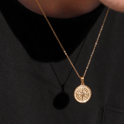 Gold compass pendant necklace set with round compass charm and layered chain necklaces
