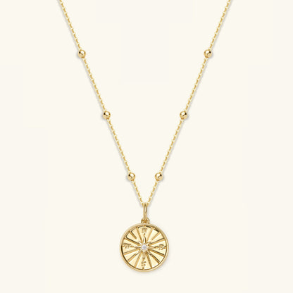 Gold filled compass pendant necklace with round compass medallion on chain