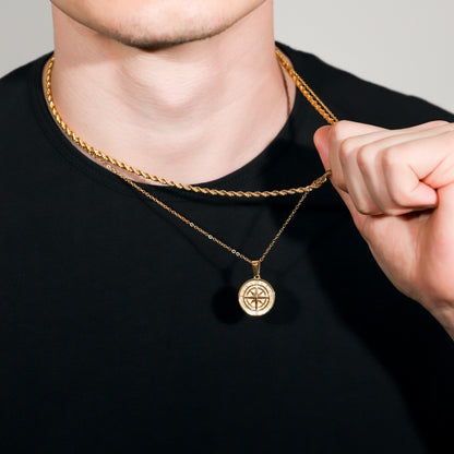 Gold rope necklace set with compass pendant, hand adjusting chain