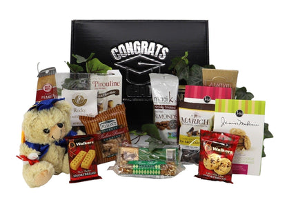 Black graduation gift box with cap “Congrats” logo and assorted snack packages inside