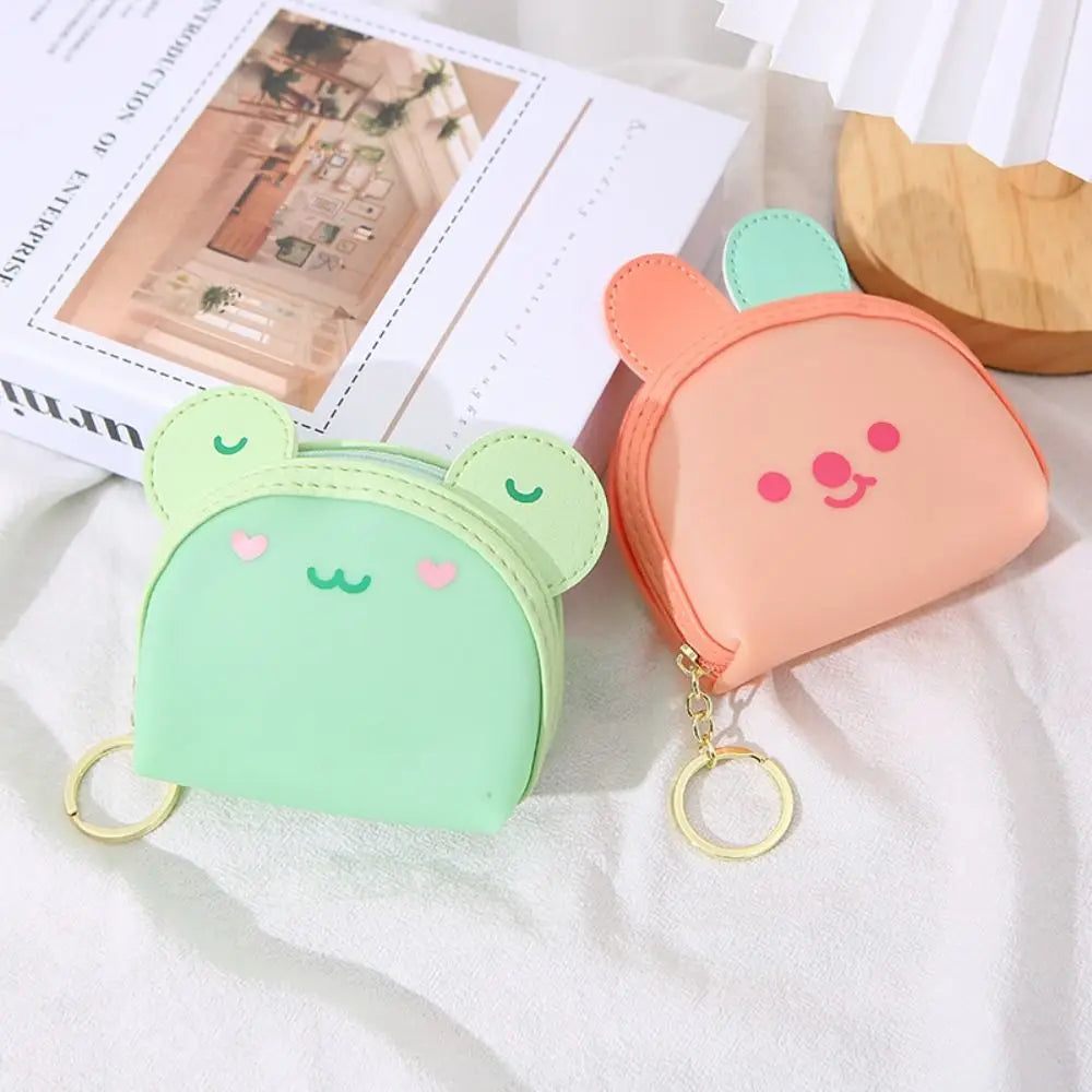 Kawaii animal coin purse with mint green and orange bear faces, each with key ring