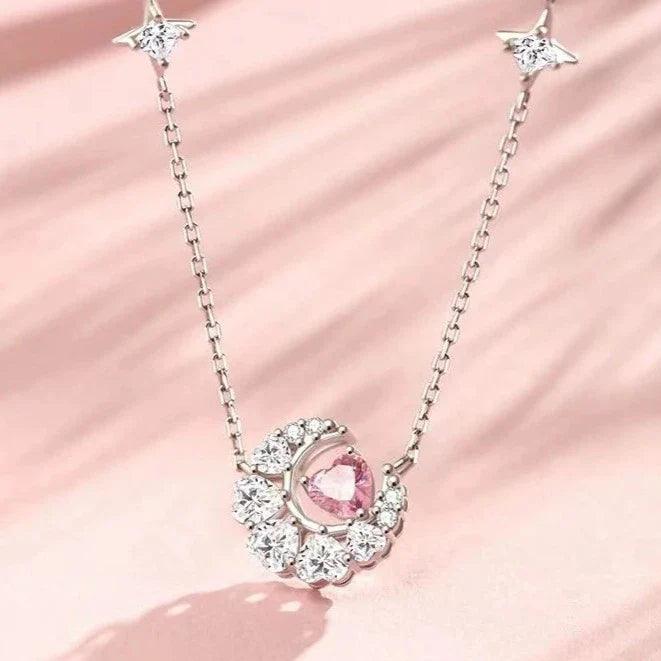 Silver-tone heart zircon pendant necklace with pink center stone and star end charms