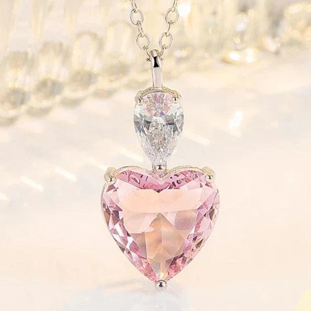 Pink heart pendant necklace with clear top stone on silver-tone chain