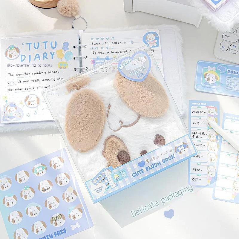 Plush puppy and cat loose-leaf notebooks with white and tan fuzzy covers