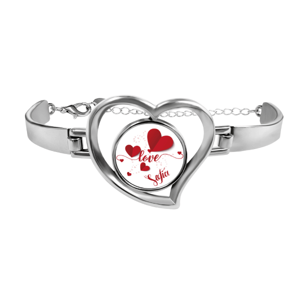 Silver-tone heart locket bracelet with red heart design and cursive name inside