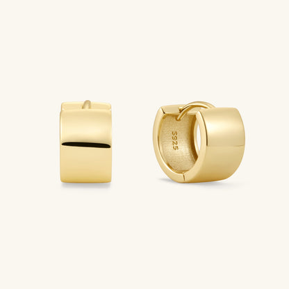 Gold small hoop earrings with smooth, squared outer edge and black inset detail
