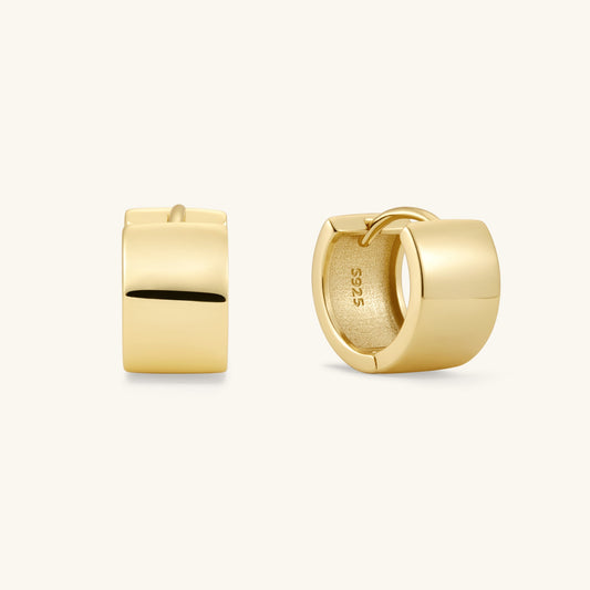 Gold small hoop earrings with smooth, squared outer edge and black inset detail