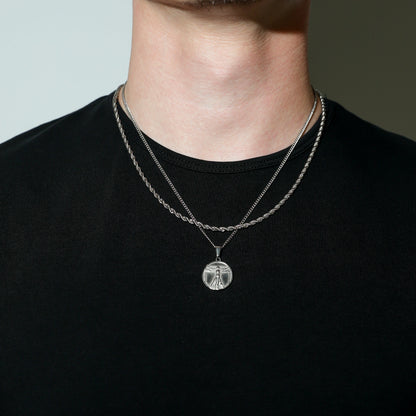 Silver rope chain necklace with round Vitruvian Man medallion pendant