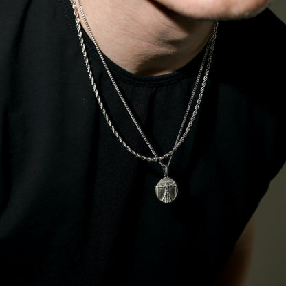 Silver rope chain necklace with round Vitruvian Man pendant medallion