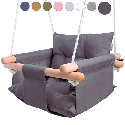 Dark gray baby hanging swing chair with wooden dowels and safety belt, no child
