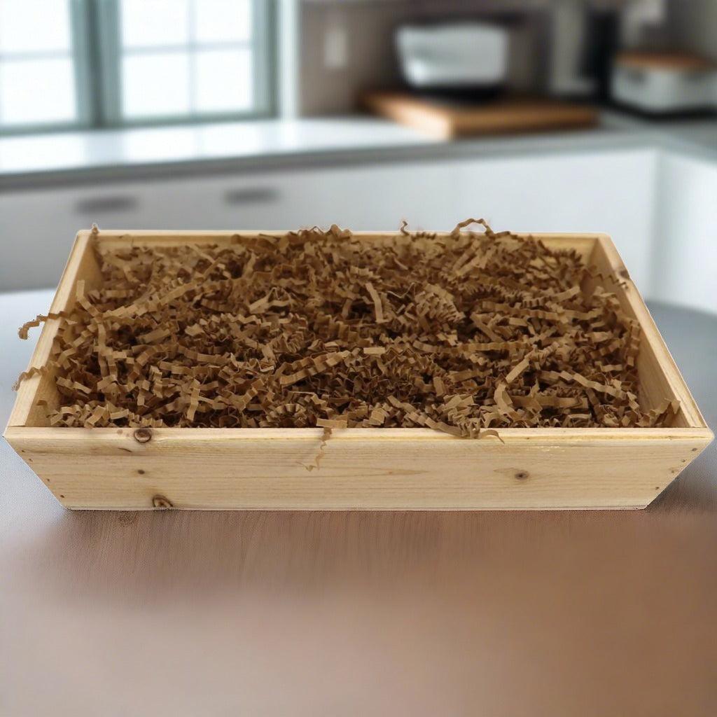 Wooden breakfast gift crate filled with brown shredded filler