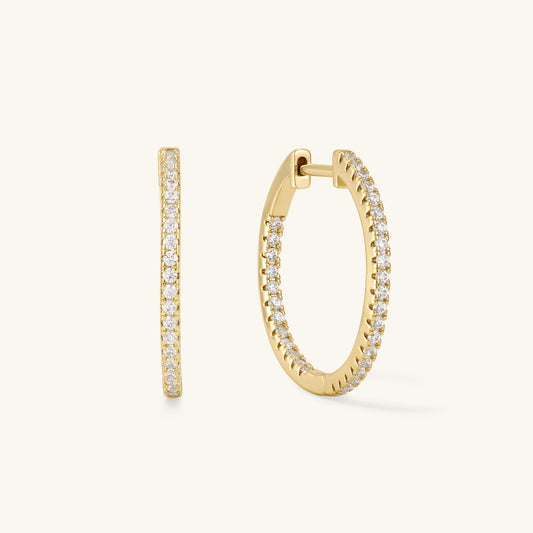 Gold diamond hoop earrings, shown front and side views