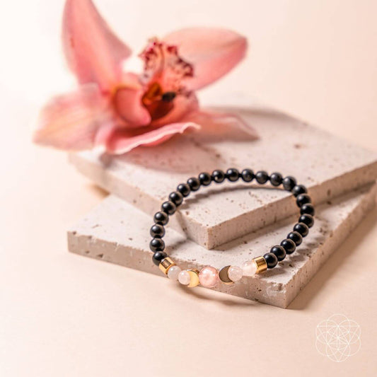 Shungite bead bracelet with black beads and pale pink gemstone accents
