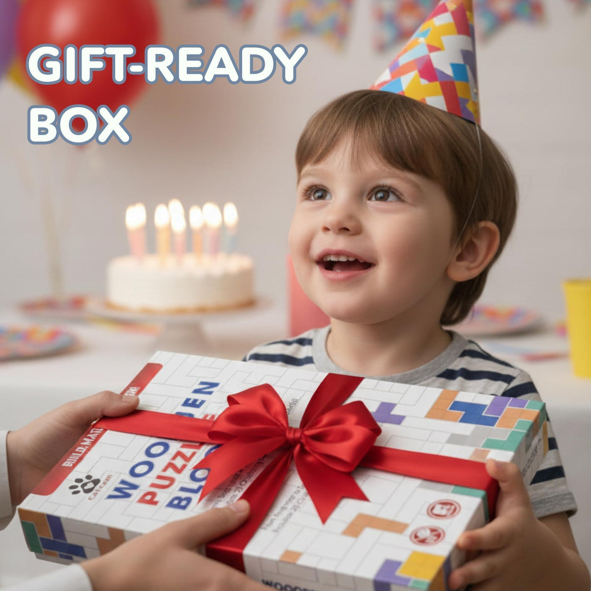 Gift box for wooden puzzle blocks with red ribbon and multicolor block graphics.
