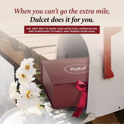 Gift box with red ribbon and Dulcet logo on the lid