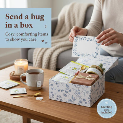 Self-care gift box on table with mug, greeting card, and assorted wellness items