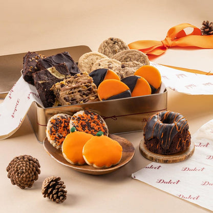 Gourmet autumn treats tin with assorted cookies and dessert pieces
