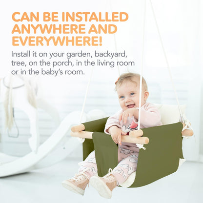 Olive canvas hanging baby swing with white cushions and wooden dowels for toddlers