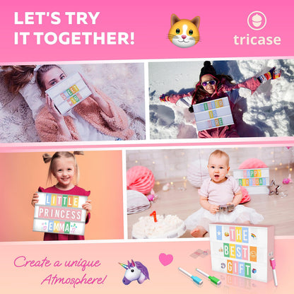 Kids using pink light box with letter tiles spelling THE BEST GIFT