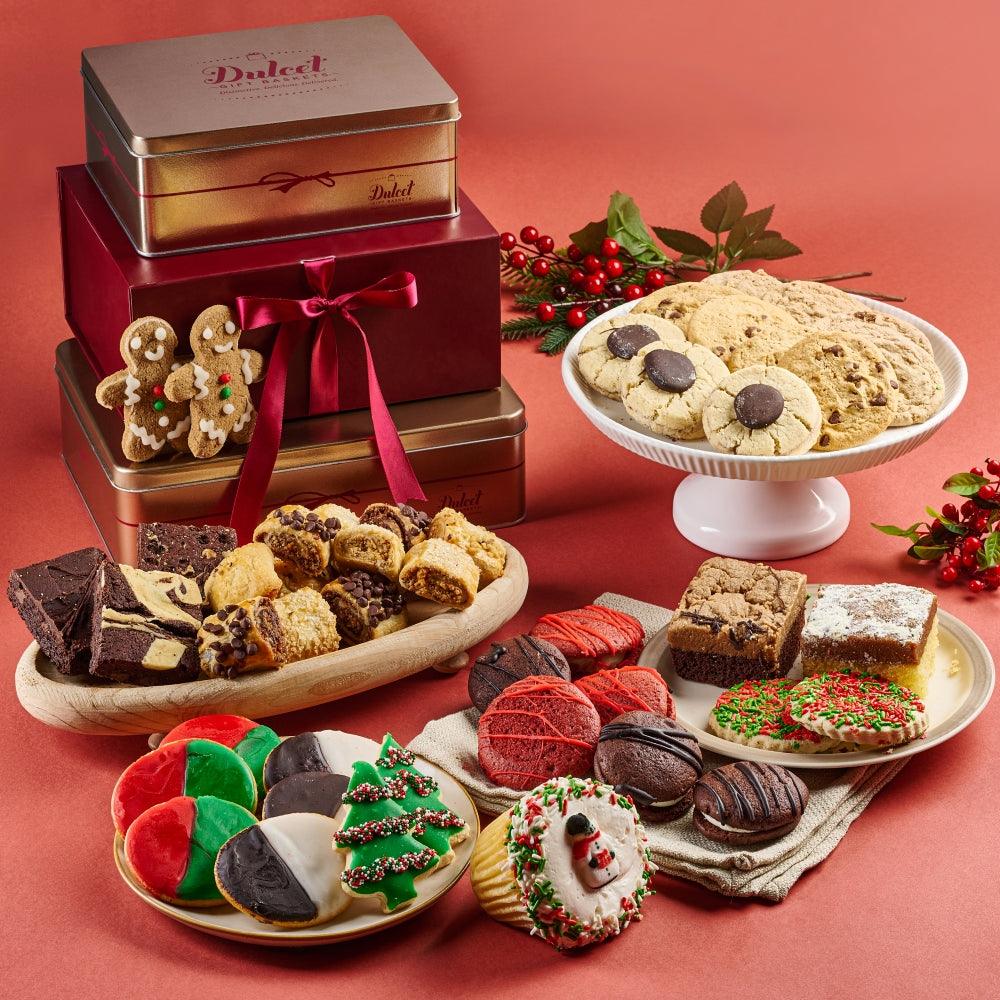 Deluxe holiday treat gift tower with assorted cookies, brownies, and tin containers