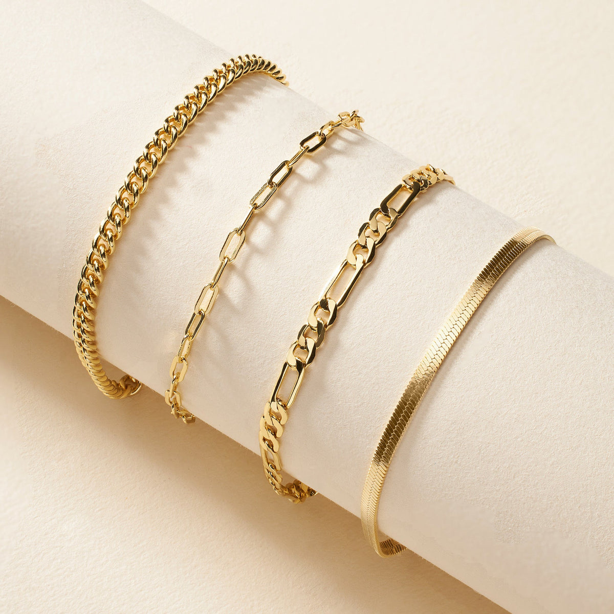 Gold paperclip chain bracelet set with clasp and adjustable extender links