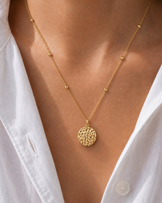 Gold coin pendant necklace with hammered round disc on delicate adjustable chain