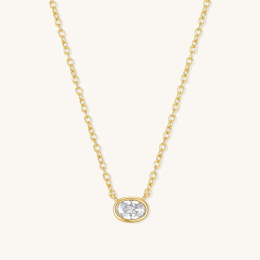 Gold oval diamond pendant necklace with link chain