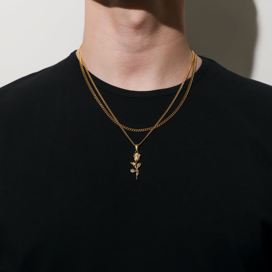 Gold-toned double necklace with rose-like pendant on fine chain