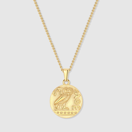 Greek owl pendant necklace with round gold medallion on curb chain.