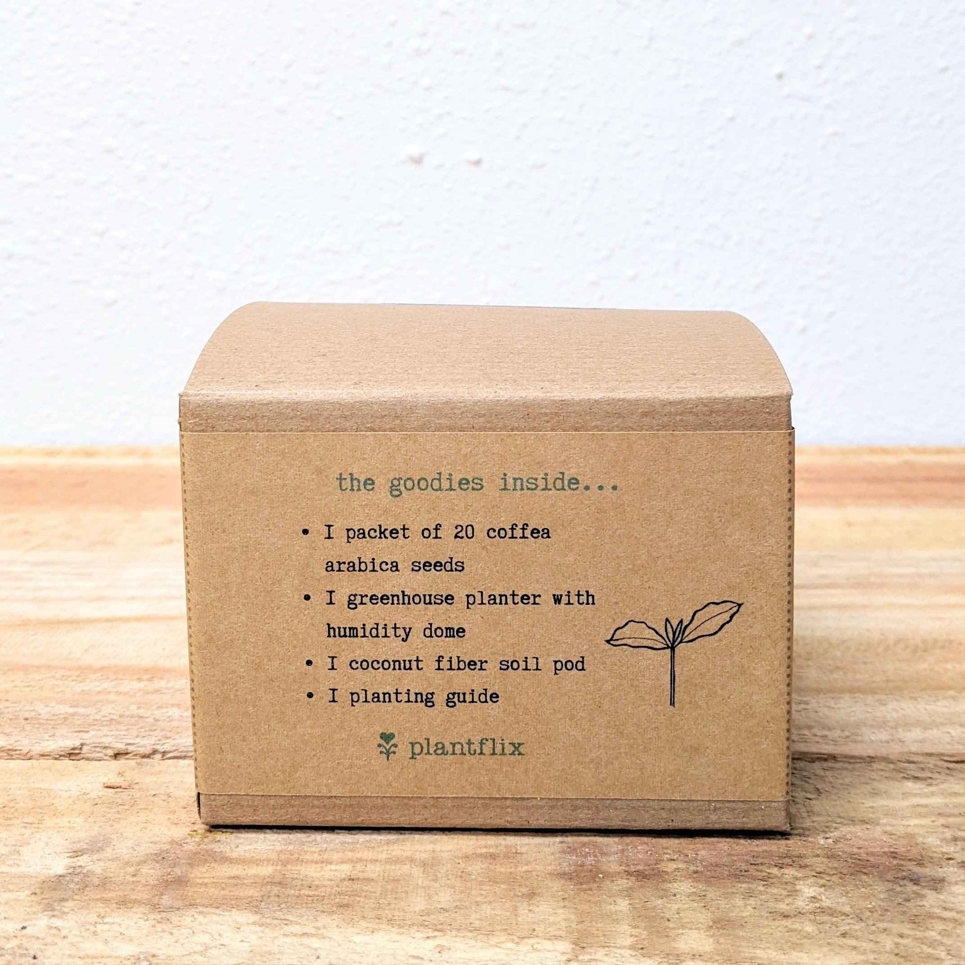 Coffee plant seed kit box side with contents list and icons