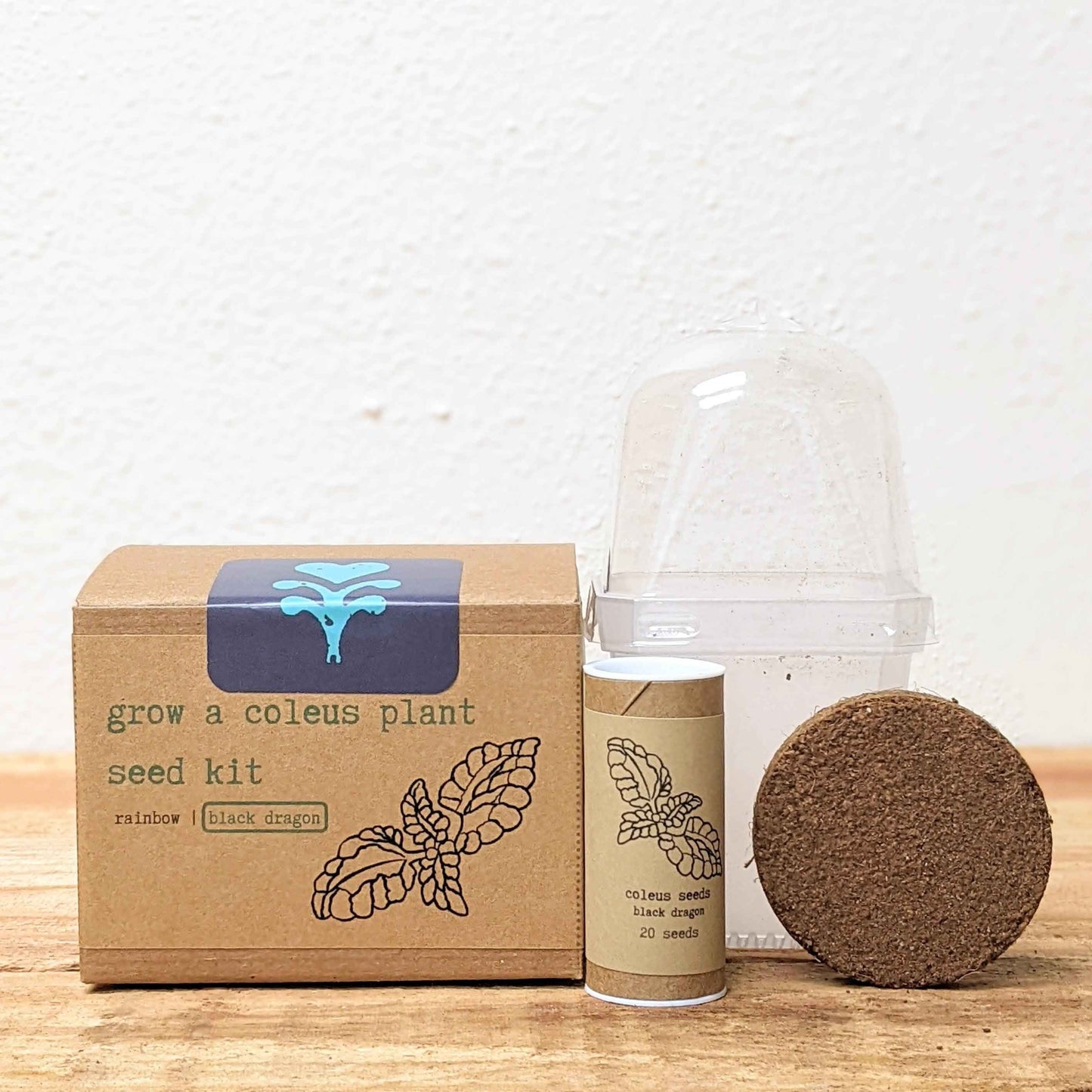 Coleus seed kit box with seed canister, seed packet, and clear dome over soil disk