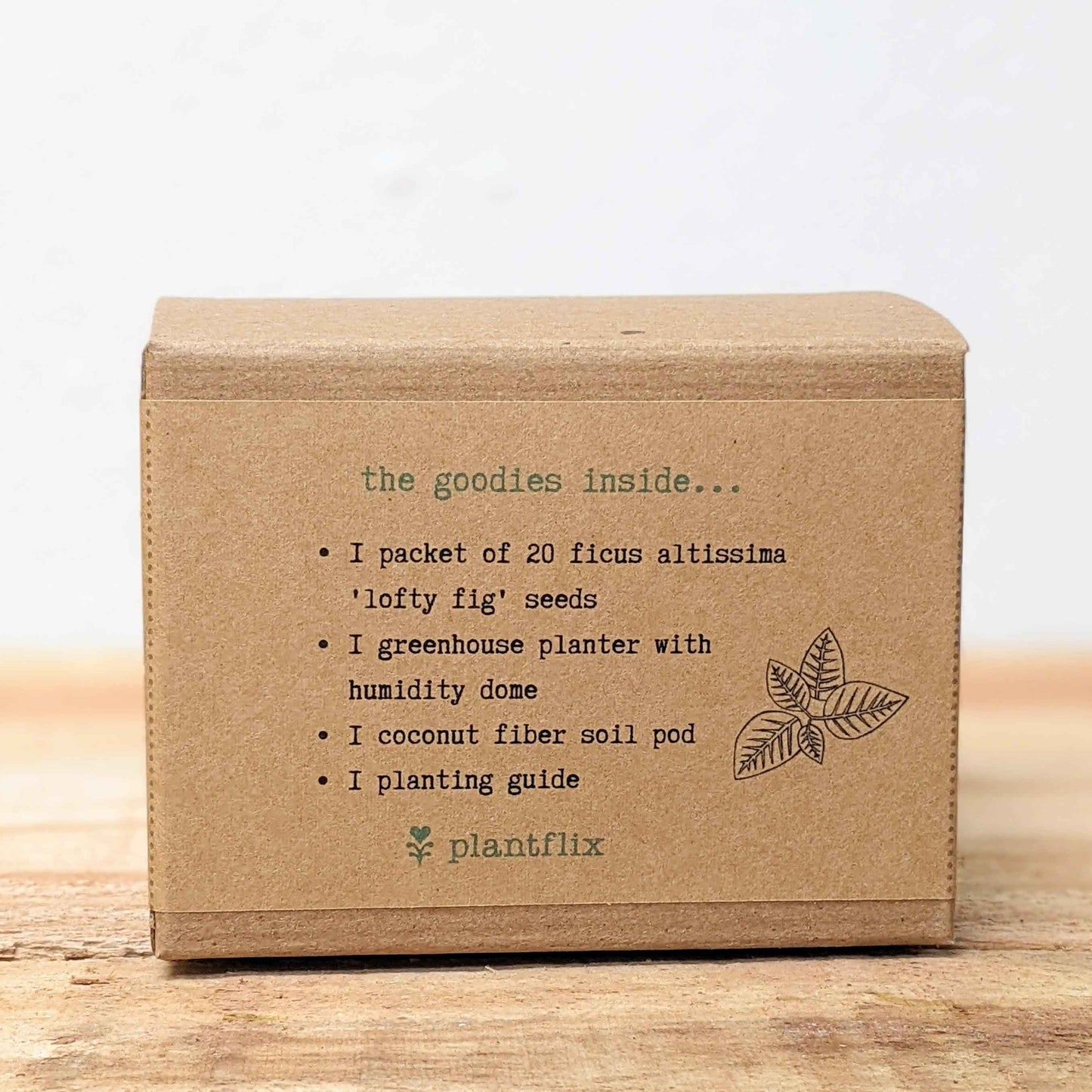 Seed kit box back showing contents list and Plantflix logo