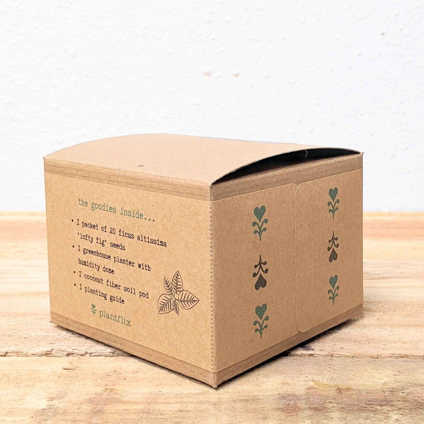 Seed kit shipping box side panel with leaf icon decals