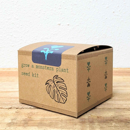 Grow a Monstera seed kit shipping box with Monstera leaf graphic