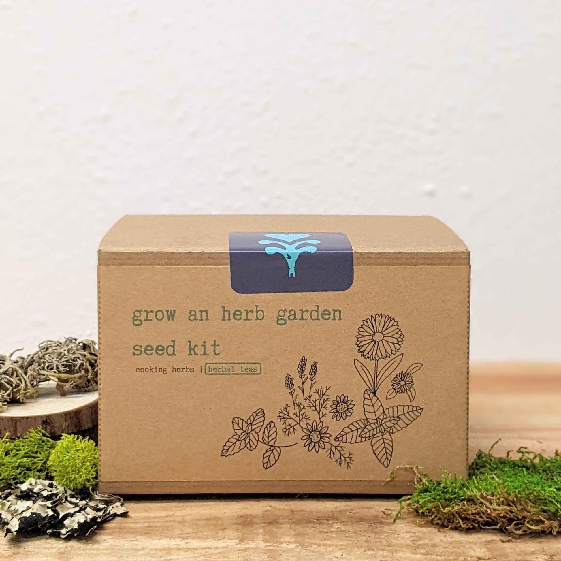 Grow an herb garden seed kit box with floral line art and tea graphic