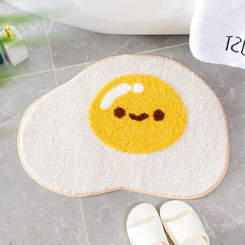 Cute egg bath mat rug with yellow smiling egg design on light gray background