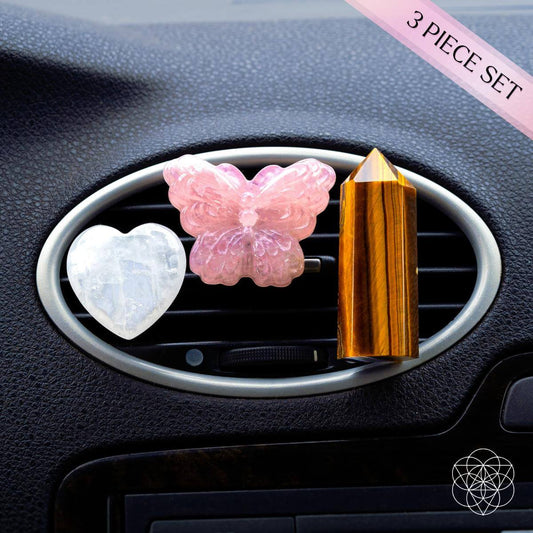 Car vent crystal set with pink butterfly, white heart, and gold striped point clip
