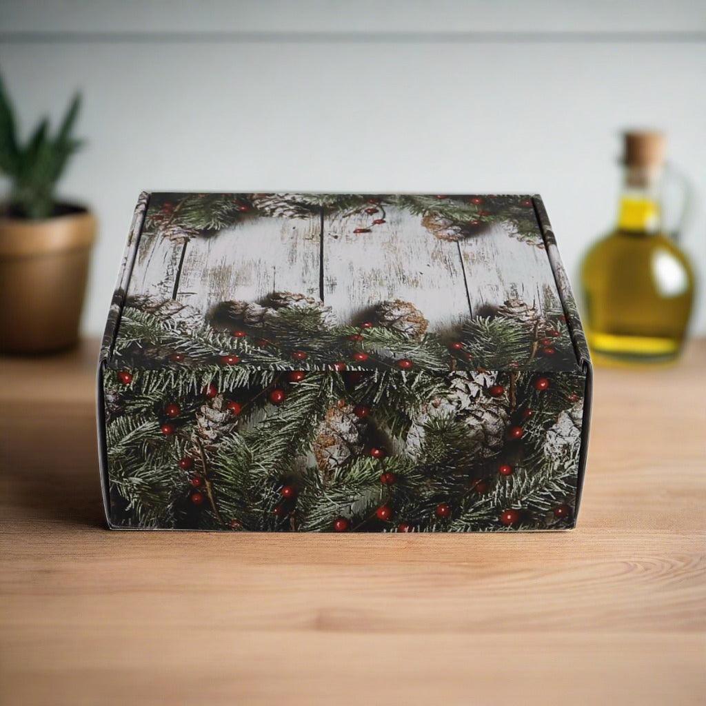 Deluxe holiday gift box with pine-branch and red-berry holiday design
