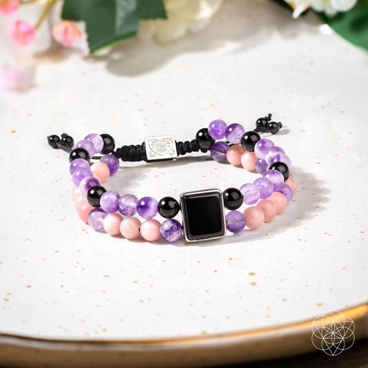 Adjustable beaded bracelet with purple and pink stones, black beads, square center charm
