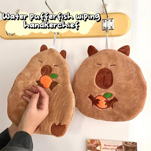 Set of two capybara cotton hand towels with hanging loops, stitched belly and fish motifs