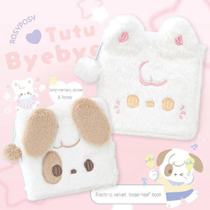 White plush cat notebook with embroidered smile, button eyes, and dangling pom charm