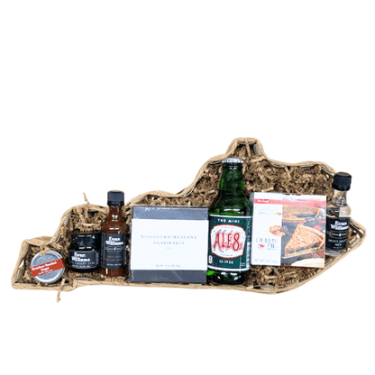 Straw gift basket with assorted bottles, sauces, and spice packets