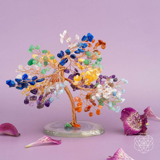 Chakra crystal tree figurine with multicolor bead clusters on a round gray base