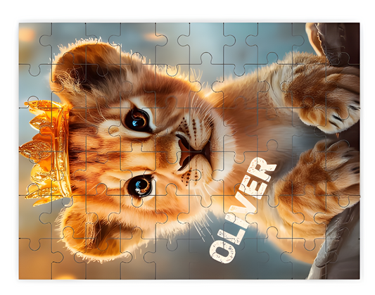 Wooden jigsaw puzzle showing a smiling lion kitten face in orange and blue