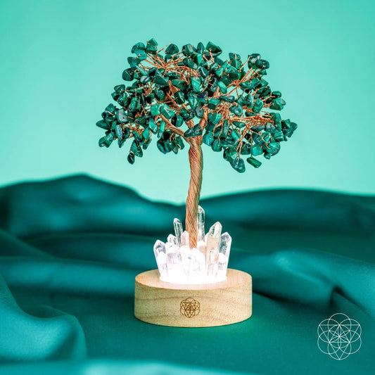 Crystal tree lamp with green malachite-style branches and clear quartz cluster in wood base