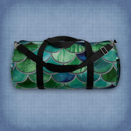 Mermaid-scale duffel bag with black straps and silver zipper pulls