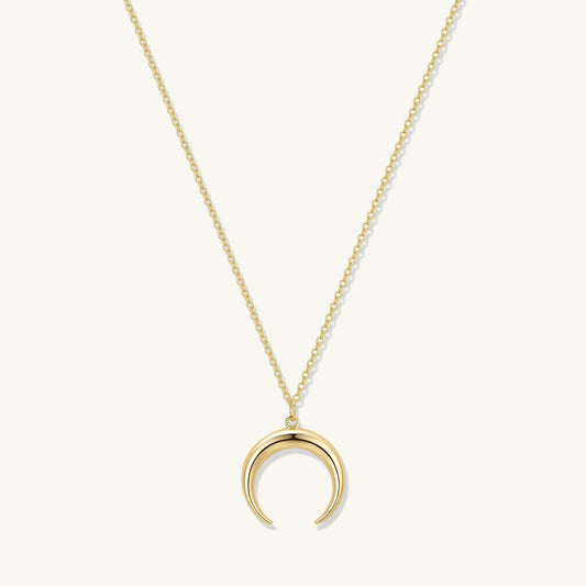 Gold crescent moon pendant necklace on fine chain