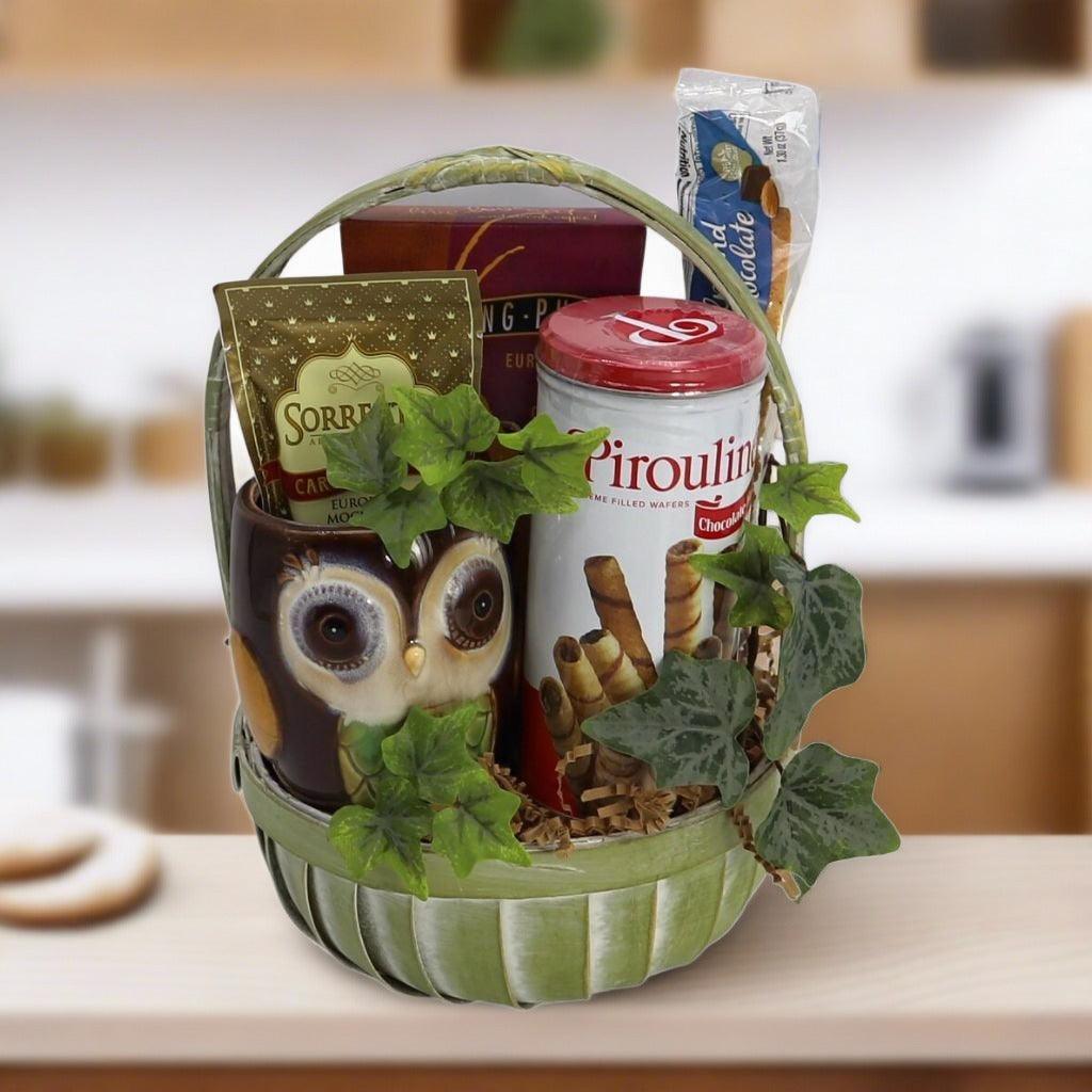 Gift basket with owl container, red-lidded chocolate wafer canister, and coffee packs