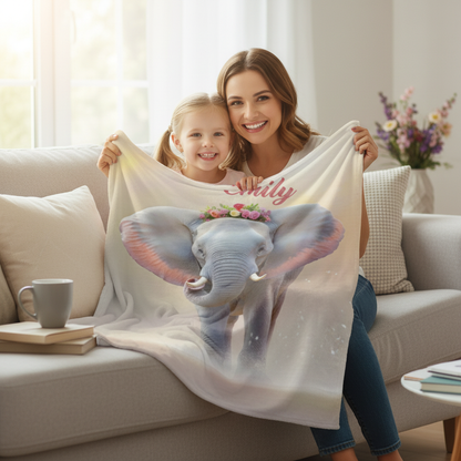Personalized elephant blanket in light cream with 'Emily' name and blue elephant artwork
